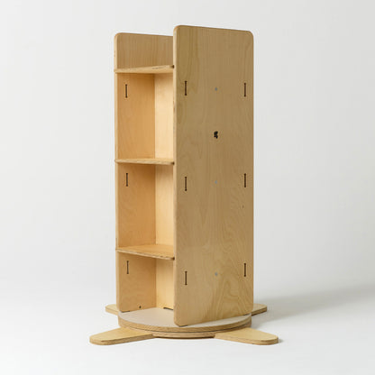 Wooden rotating bookshelf with a PlaySystems logo on a white background